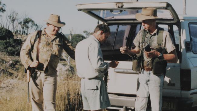 Jeffrey and David Brooks with a friend on a hunting trip in their younger days.