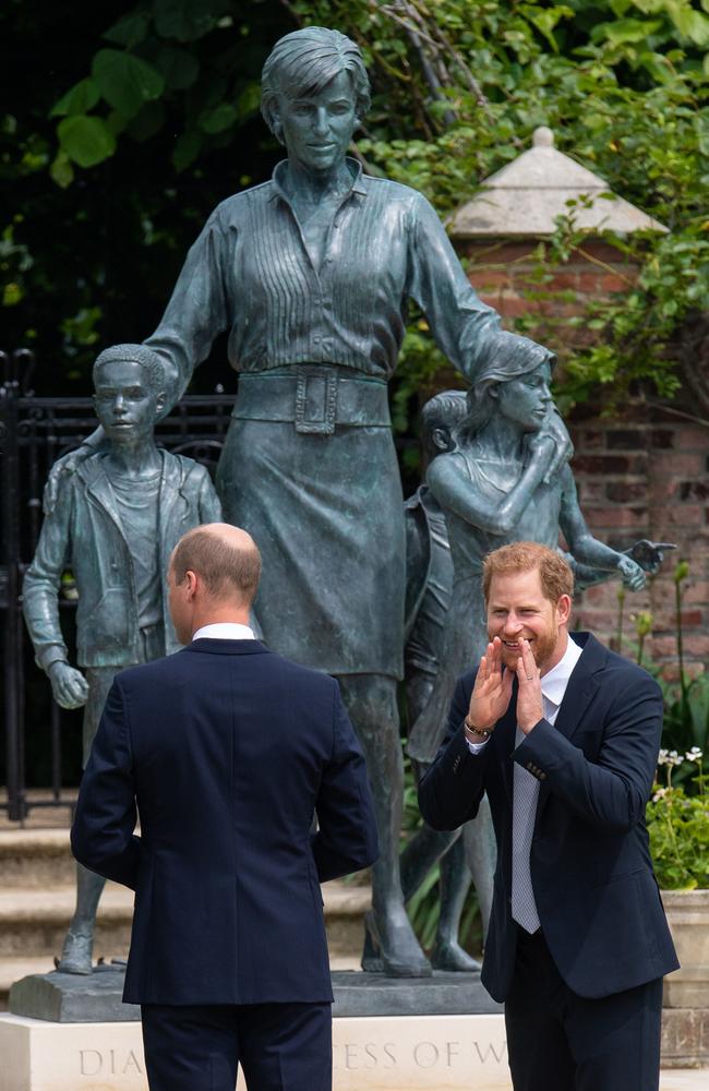 Prince William, Duke of Cambridge (left) and Prince Harry, Duke of Sussex unveil a statue they commissioned of their mother Diana, Princess of Wales, in the Sunken Garden at Kensington Palace. Picture: Getty