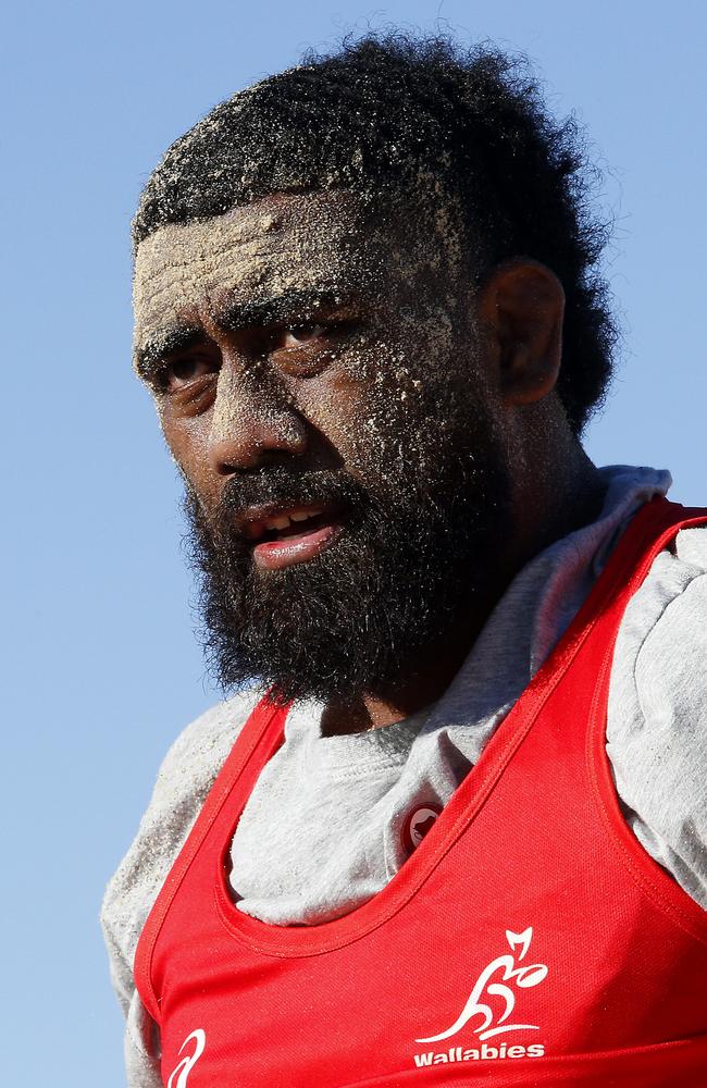 A sandy faced Seru Uru during a Wallabies Training session on Coogee Beach. Picture: John Appleyard