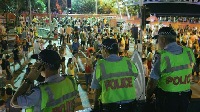 Police officers watch over the Schoolies week celebrations at Surfers Paradise. Picture: File