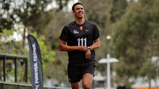 Adrian Cole pushes himself to the limit during the 2km time trial. Picture: Dylan Burns/AFL Photos via Getty Images