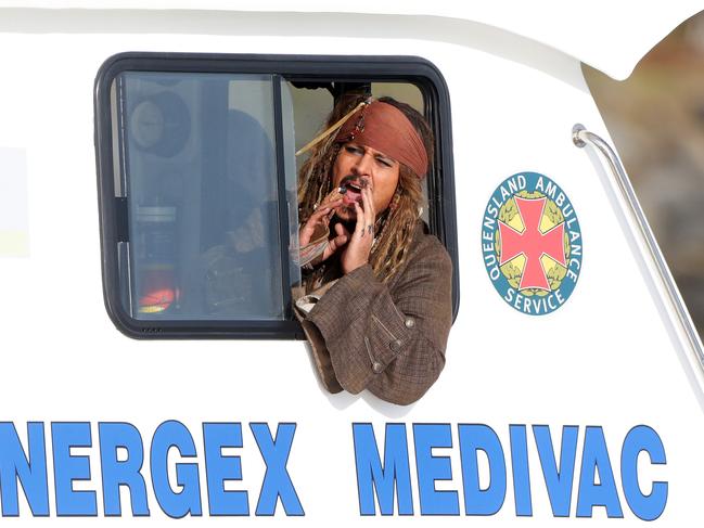 Johnny Depp leaves on a boat to be ferried out to Moreton Bay to continue filming Pirates of the Caribbean. Picture: Liam Kidston