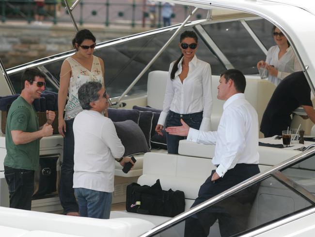 Cruise with (L-R) seven-months pregnant Katie Holmes, former Yahoo chairman and CEO Terry Semel, Erica Baxter and Packer aboard Packer's launch Carpe Diem on Sydney Harbour in 2006. 