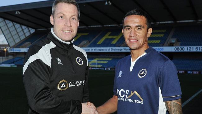 Former teammates Neil Harris (current manager) and Tim Cahill reunite.