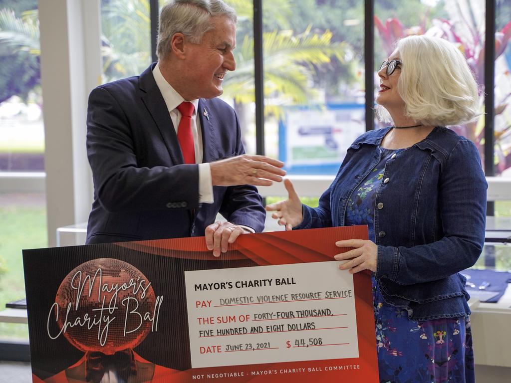 Mackay Mayor Greg Williamson handing a cheque for half of the proceeds from the Mayor's Charity Ball to Mackay Women's Services executive director Linda-Ann Northey. The ball also fundraised for Heart Kids. Picture: Heidi Petith