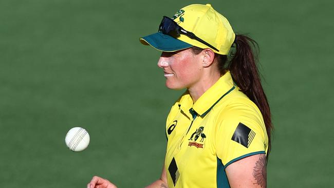 BRISBANE, AUSTRALIA - DECEMBER 05: Megan Schutt of Australia leaves the field after taking 5 wickets during game one of the Women's One Day International Series between Australia and India at Allan Border Field on December 05, 2024 in Brisbane, Australia. (Photo by Chris Hyde/Getty Images)