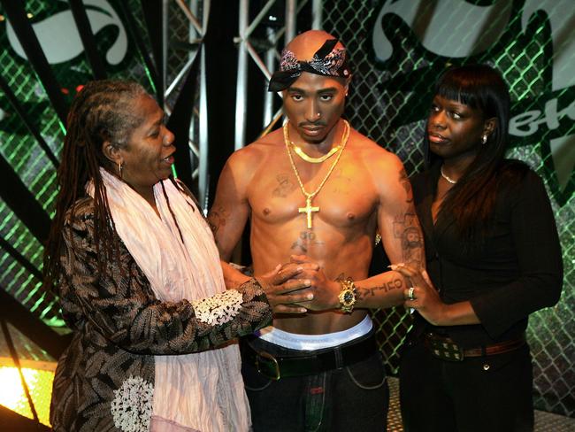 Sekyiwa Shakur, on right, with a sculpture of her late brother, Tupac Shakur. Picture: AP