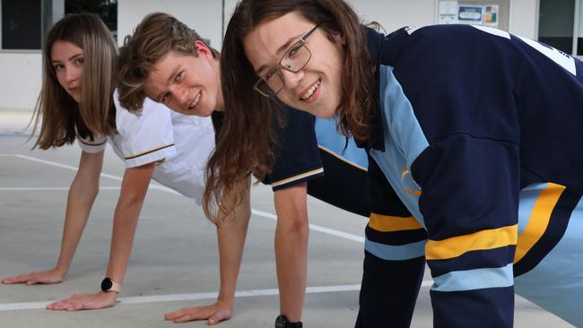 Elizabeth C, Arki M, Astyn H take part in the 'Push For Better' challenge at Ormeau Woods State High School.