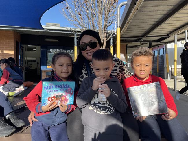 Albanvale Primary School: Makeleta (middle) with her three kids Lavinia (left), Sulo (middle) and Solo (right) at Albanvale's book week event. Picture: Athos Sirianos