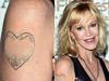 Melanie Griffith covers Antonio tattoo