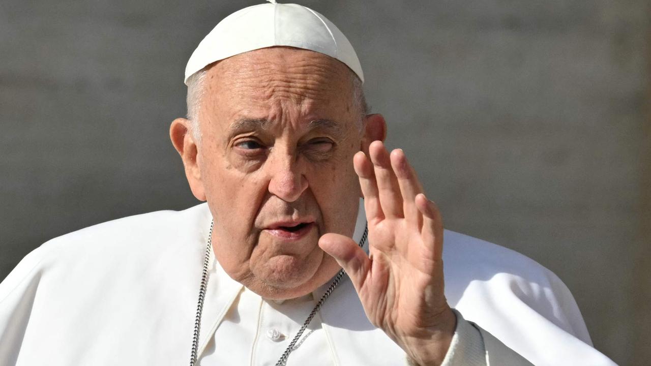 Pope Francis waves to the crowd as he arrives for the weekly general audience on May 15, 2024 at St Peter’s square in The Vatican. Picture: Andreas Solaro/AFP