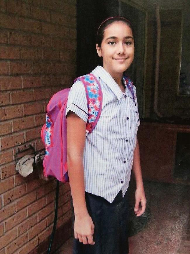 Tiahleigh Palmer in her school uniform with the backpack she was wearing when she went missing.