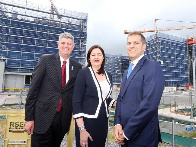 Queensland Premier Annastacia Palaszczuk and Minister Sterling Hinchliffe inspect the style of apartment to be built a Parklands Village in 2016 with Daniel Grollo. Picture: Richard Gosling