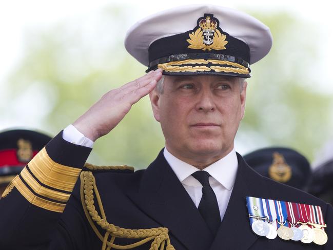 (FILES) In this file photo taken on June 27, 2015 Britain's Prince Andrew, Duke of York salutes military personnel during the Armed Forces day parade in Guildford. - Prince Andrew on November 20, 2019 said he was cancelling his public engagements, as the outcry from the British royal's friendship with convicted sex offender Jeffrey Epstein showed no sign of abating. (Photo by Justin TALLIS / AFP)