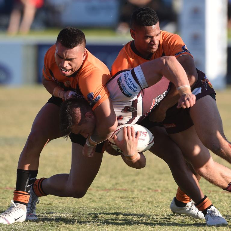 Rugby League Gold Coast A grade grand final between Burleigh and Southport at Pizzey Park. Burleigh's Brett Stratton tacked by Campbell Pirihi. (Photo/Steve Holland)