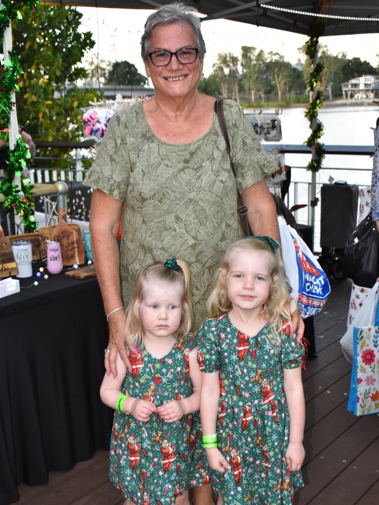 Roslyn Preston with granddaughters Charlotte and Adelyn Dobinson at the CBD Christmas Fair in Rockhampton on December 3, 2022.