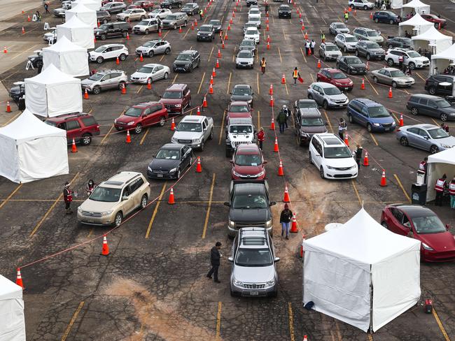 People drive their cars to medical tents at a mass Covid-19 vaccination event on January 30 in Denver, Colorado. Picture: AFP