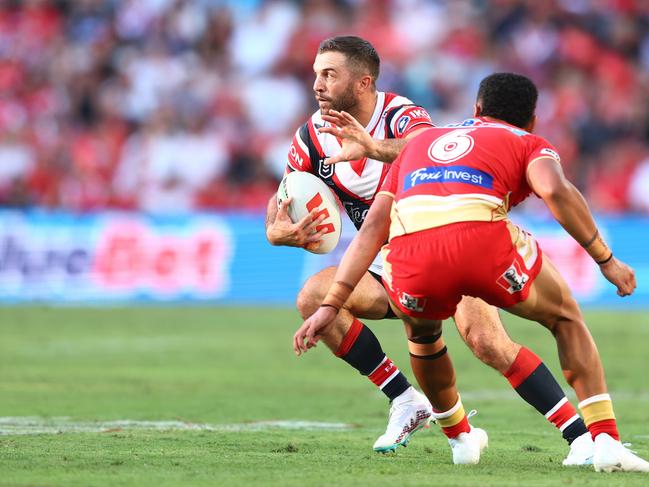 BRISBANE, AUSTRALIA - MARCH 05: James Tedesco of the Roosters runs the ball during the round one NRL match between the Dolphins and Sydney Roosters at Suncorp Stadium on March 05, 2023 in Brisbane, Australia. (Photo by Chris Hyde/Getty Images)