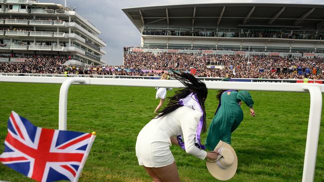 Animal rebellion activist run onto the racecourse, on day two of the Epsom Derby. Picture: Getty Images.