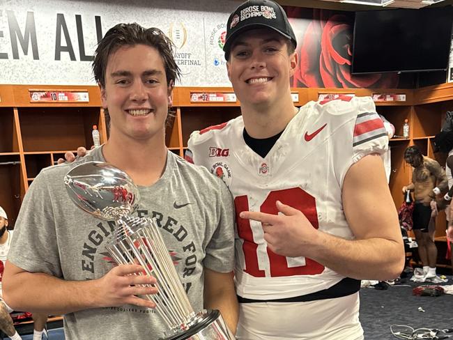 Joe McGuire with Ohio Quarter back Will Howard and the Rose Bowl Trophy.