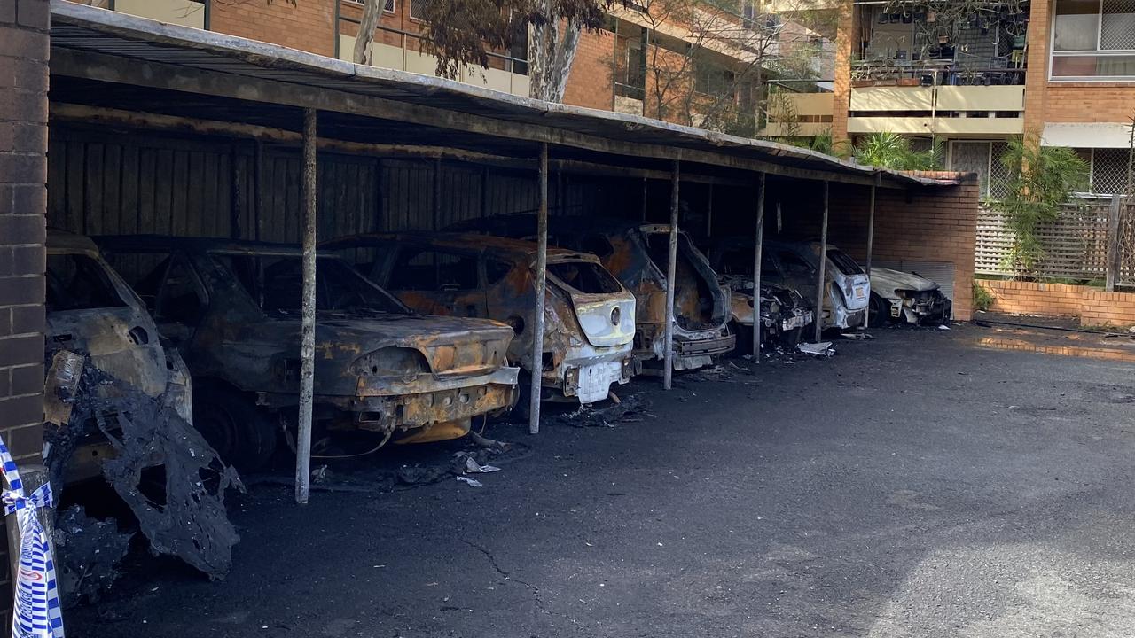 Seven cars were destroyed by fire at this Dutton Park unit complex overnight. Picture: Finn Morton