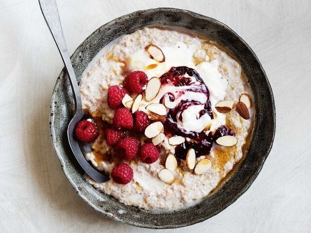 A bowl of porridge made with milk and topped with nuts and seeds can boost your calcium. Picture: Supplied