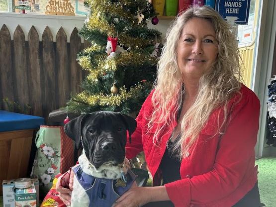 Bear, a medical surrender, with his foster carer Shelley Shay after undergoing surgery. DOG