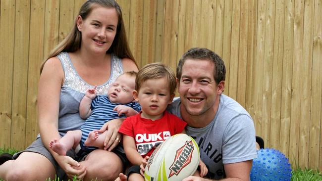 FAMILY: Paul Cohen with his wife Casey and children Cooper 10 weeks and Mitchell 21 months, back in 2010. Mitchell will play his first game of footy for Kawana this weekend. Picture: Jason Dougherty