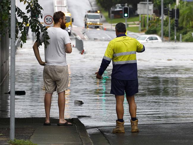 Whiddop Road was closed due to flooing in Toombul after heavy rain fell overnight in Brisbane. Picture: Tertius Pickard