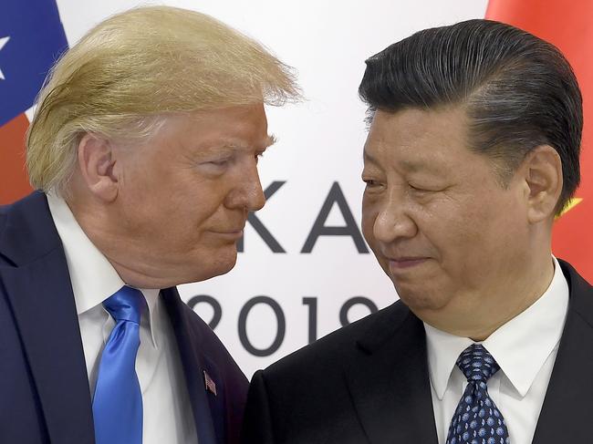 FILE - U.S. President Donald Trump, left, meets with Chinese President Xi Jinping during a meeting on the sidelines of the G-20 summit in Osaka, Japan,  June 29, 2019. (AP Photo/Susan Walsh, File)
