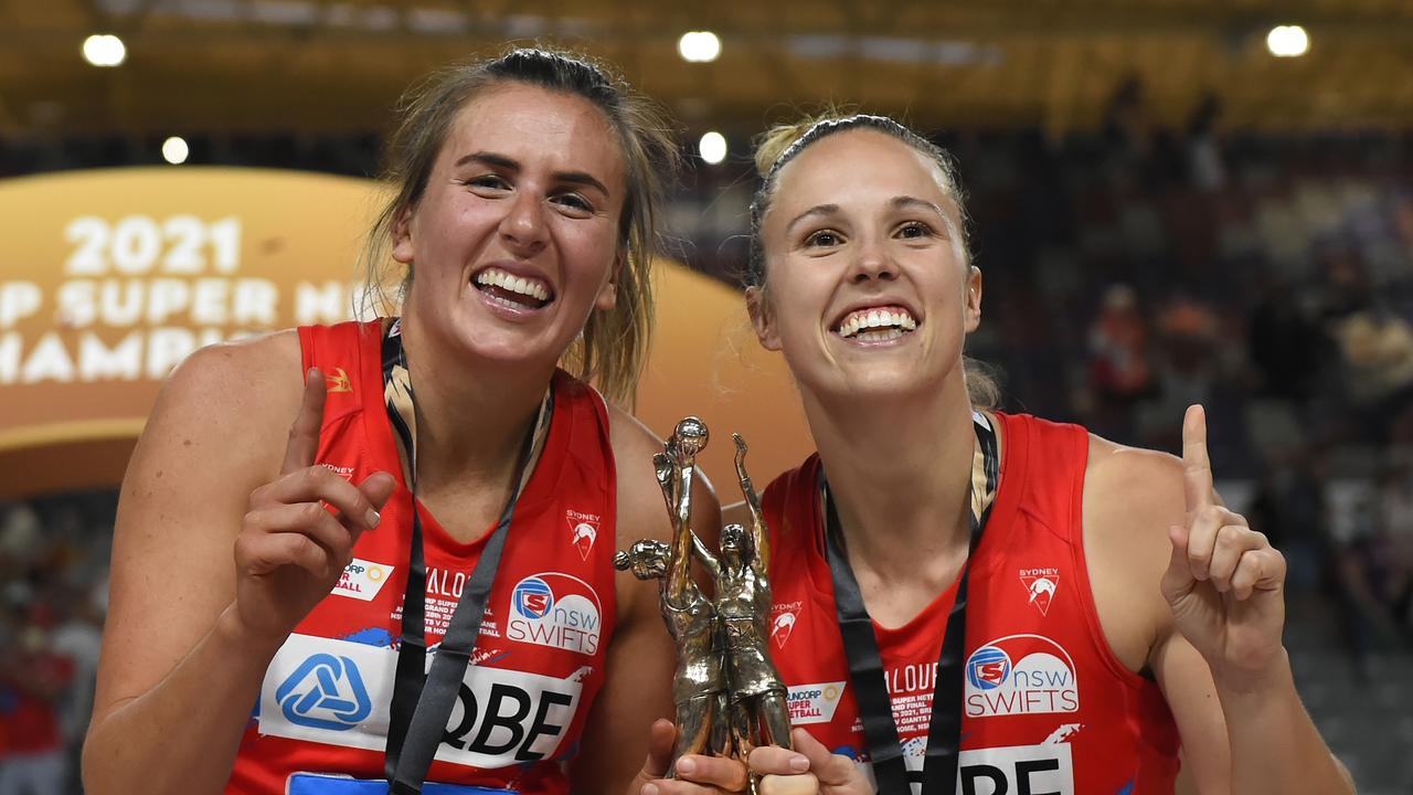 Paige Hadley (R) of the Swifts celebrating the 2021 Suncorp Super Netball premiership with teammate Maddy Proud.