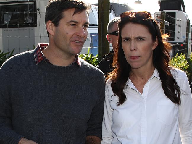 HAMILTON, NEW ZEALAND - JUNE 14:  New Zealand Prime Minister Jacinda Ardern (R) and her partner Clarke Gayford (L) take a walk around the Fieldays in Mystery Creek on June 14, 2018 in Hamilton, New Zealand. The public appearance is expected to be the Prime Ministers last before giving birth to her baby due on Sunday.  (Photo by Phil Walter/Getty Images)