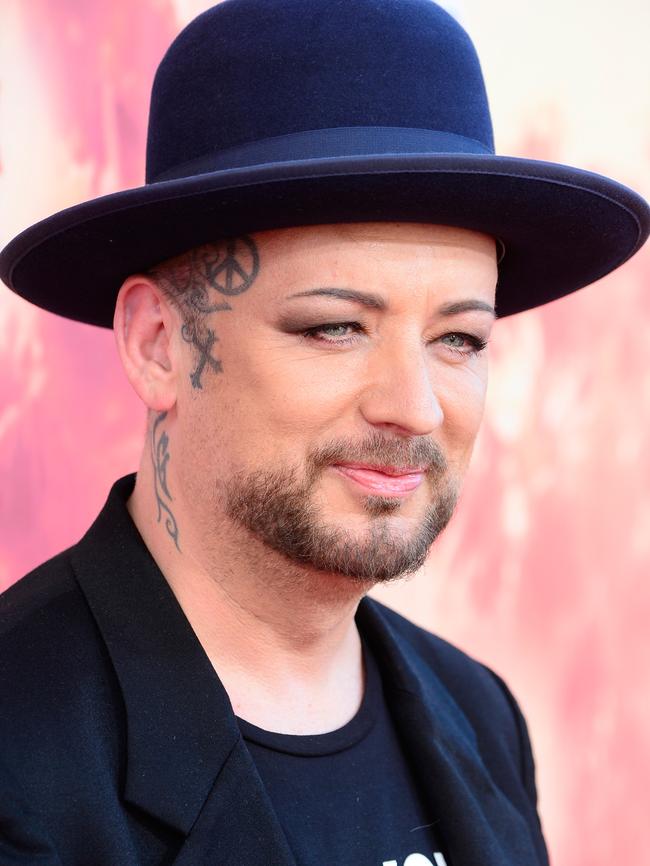 Boy George wore his trademark eye makeup.