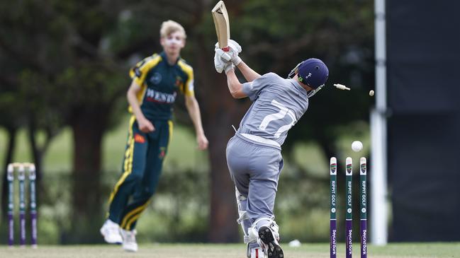 Joseph Vandenbergh knocking over the stumps. Picture: Michael Gorton