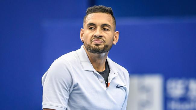 Kyrgios is on probation on the tennis court after smashing two racquets, abusing the umpire and spitting on court. Picture: AFP