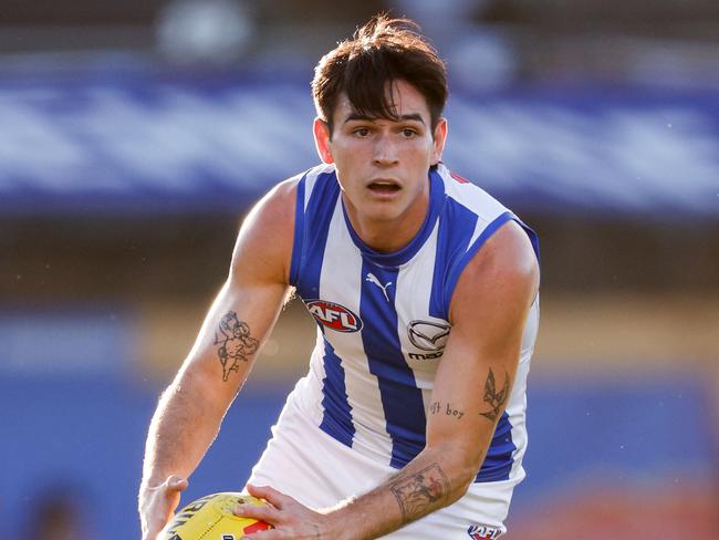 ADELAIDE, AUSTRALIA - APRIL 05: Zac Fisher of the Kangaroos in action during the 2024 AFL Round 04 match between the Brisbane Lions and the North Melbourne Kangaroos at Norwood Oval on April 05, 2024 in Adelaide, Australia. (Photo by Dylan Burns/AFL Photos via Getty Images)