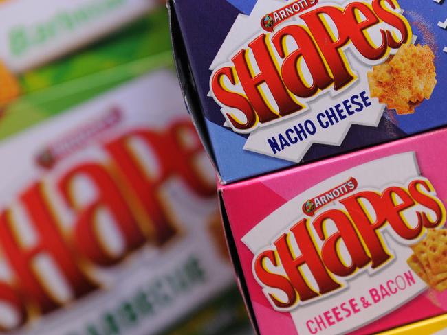 Packets of Arnott's biscuits pictured in Sydney, Friday, April 15, 2016. Arnott's has changed the flavour of its classic Shapes and released two new varieties, Roast Chicken and Hot Dog. (AAP Image/Joel Carrett) NO ARCHIVING