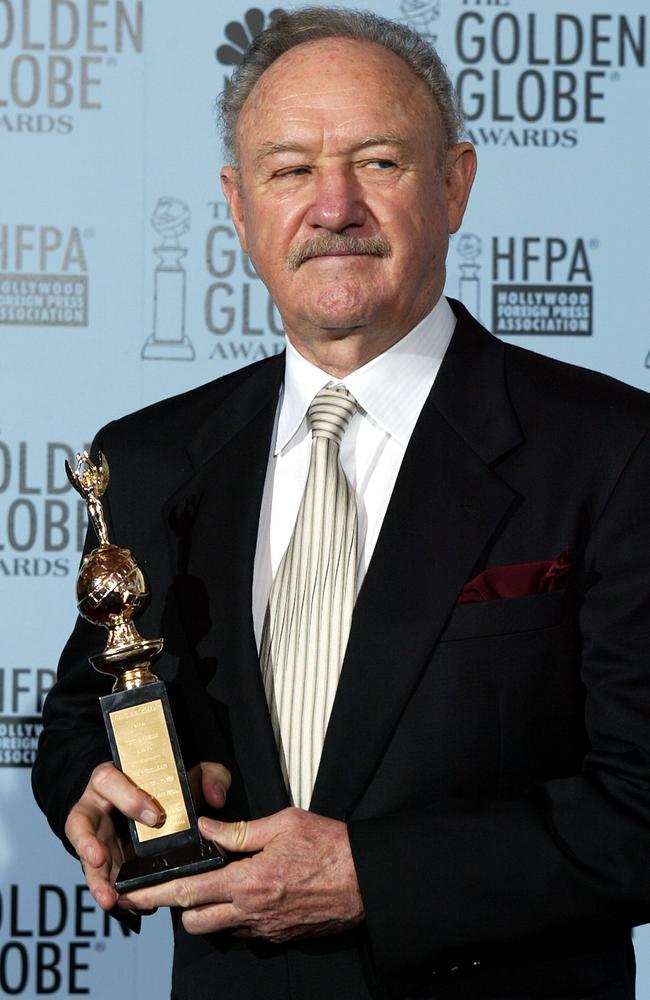 Gene Hackman holds the Cecile B. DeMille Award at the Golden Globes in 2012. Picture: AFP