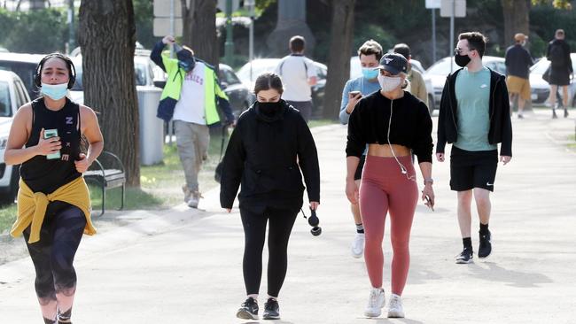 People wearing masks at the Tan on Friday. Picture: NCA NewsWire/David Crosling