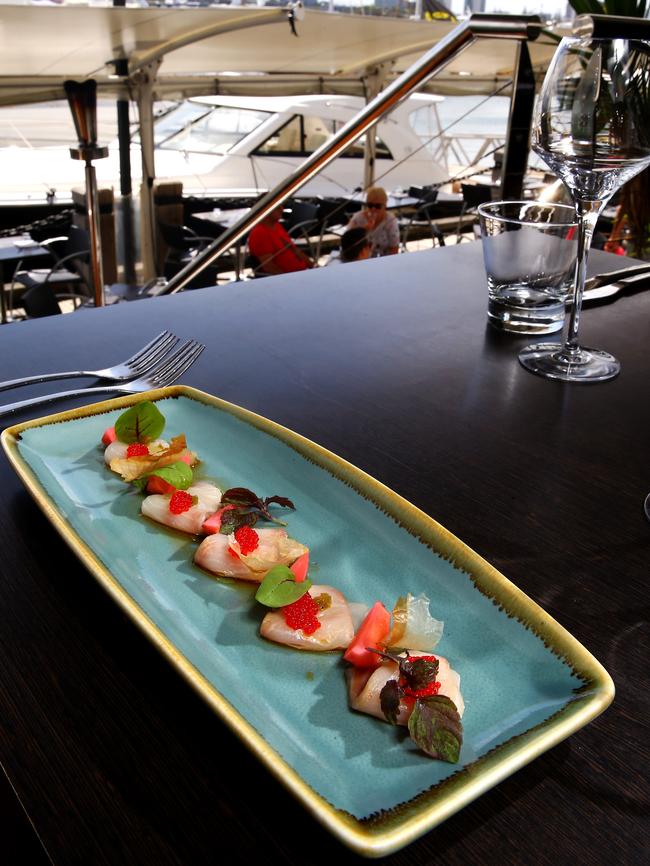 Glass Dining and Lounge Bar: Carpaccio of hiramasa kingfish, pickled radish, yuzu soy, jalapeño, flying fish roe. Photo: David Clark