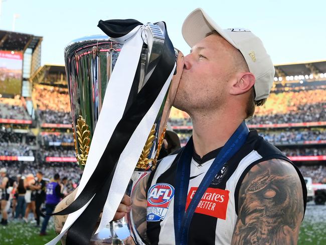 MELBOURNE, AUSTRALIA – SEPTEMBER 30: Jordan De Goey of the Magpies celebrates with the Premiership Cup during the 2023 AFL Grand Final match between Collingwood Magpies and Brisbane Lions at Melbourne Cricket Ground, on September 30, 2023, in Melbourne, Australia. (Photo by Quinn Rooney/Getty Images)