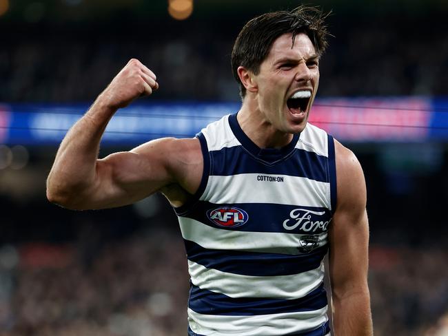 MELBOURNE, AUSTRALIA - JULY 12: Oliver Henry of the Cats celebrates a goal during the 2024 AFL Round 18 match between the Collingwood Magpies and the Geelong Cats at Melbourne Cricket Ground on July 12, 2024 in Melbourne, Australia. (Photo by Michael Willson/AFL Photos via Getty Images)