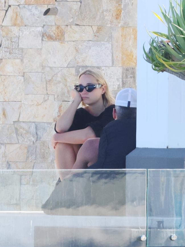 Jade Yarbrough was seen in a tense exchange with boyfriend Michael Clarke at their holiday home two days before their public fight. Picture: Matrix