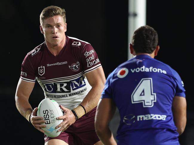GOSFORD, AUSTRALIA - APRIL 09: Reuben Garrick of the Manly Sea Eagles is tackled during the round five NRL match between the New Zealand Warriors and the Manly Sea Eagles at Central Coast Stadium, on April 09, 2021, in Gosford, Australia. (Photo by Ashley Feder/Getty Images)