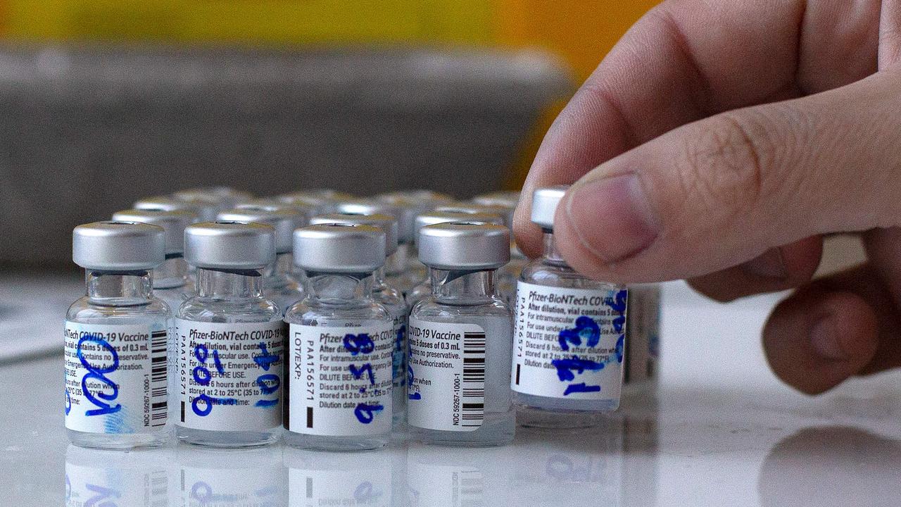 A nurse holds a vial of a Pfizer-BioNTech COVID-19 vaccine. Picture: Claudio Reyes/AFP