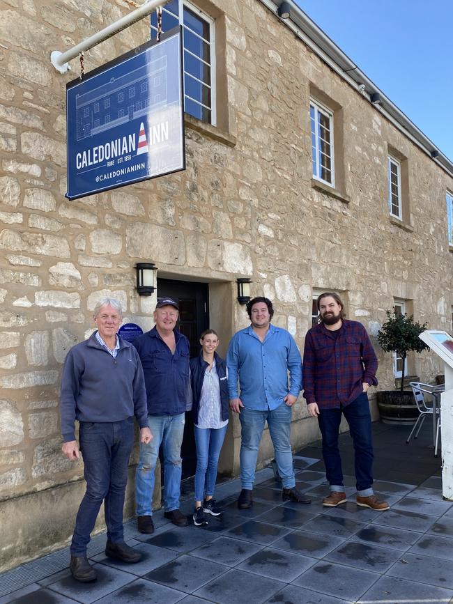 The Caledonian Inn owners and staff Geoff Prest, Maurice Honner, Jazzy Dawson, Henry Barritt and Henry Vietch in front of the pub. Picture: Supplied