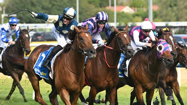 Jimmysstar (left) storms past She’s Bulletproof and Rey Magnerio to win the Group 1 Oakeligh Plate at Caulfield. Picture: Vince Caligiuri/Getty Images