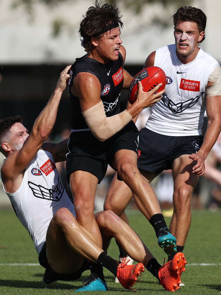 Collingwood star Jack Ginnivan is tackled by Jack Crisp at Olympic Park. Pictures: Michael Klein