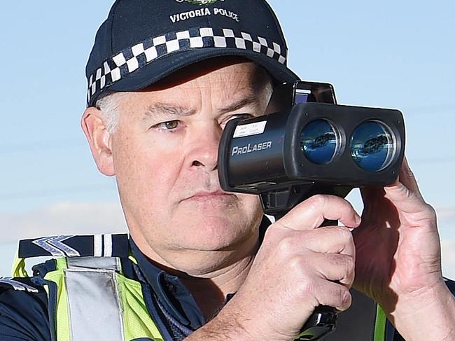 Police are cracking down on new road rule making people slow down to 40kmh around emergency incidents. State Highway Patrol police  Leading S/C Dean Maguire at Sunbury. Picture: Lawrence Pinder