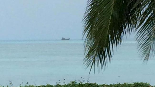 The fishing boat suspected to be carrying asylum-seekers was spotted by a Cocos Island ferry.